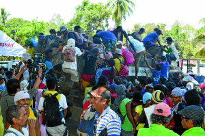 Farmers who barricaded a highway in Kidapawan City, North Cotabato, to demand for food aid from government, board the truck that will bring them home after they received rice donations from celebrities and private groups. Photo by Williamor Magbanua, INQUIRER Mindanao