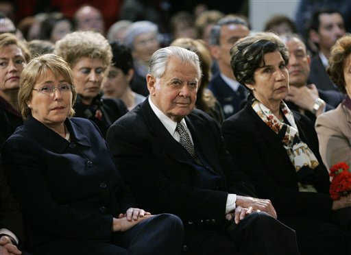 In this Sept. 11, 2006 file photo, Chile's former President Patricio Aylwin, center, attends a ceremony marking the 33rd anniversary of the military coup led by Gen. Augusto Pinochet, at La Moneda presidential palace in Santiago, Chile, sitting between Chile's President Michelle Bachelet, left, and Congresswoman Isabel Allende, daughter of Salvador Allende, the president who was toppled in the coup. Aylwin, who lead Chile's transition from military dictatorship to democracy, died on Tuesday, April 19, 2016, according to the Interior Minister Jorge Burgos. He was 97. (AP Photo/Santiago Llanquin, File)