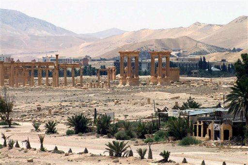 FILE - This file photo released on Sunday, May 17, 2015, by the Syrian official news agency SANA, shows the general view of the ancient Roman city of Palmyra, northeast of Damascus, Syria. AAn Iraqi military spokesman says the long-awaited military operation to recapture the northern city of Mosul from Islamic State militants "has begun." A Syrian official and a an opposition monitoring group also say Syrian government forces are trying to recapture the heart of Palmyra, controlled by the Islamic State group. (SANA via AP, File)