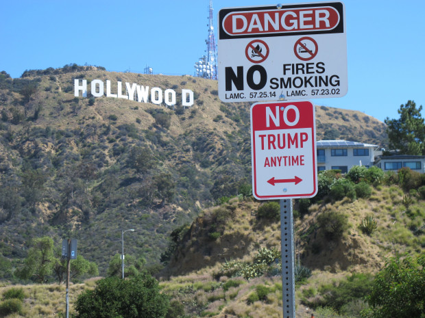 “ No Trump” signs appear in cities across the USA.