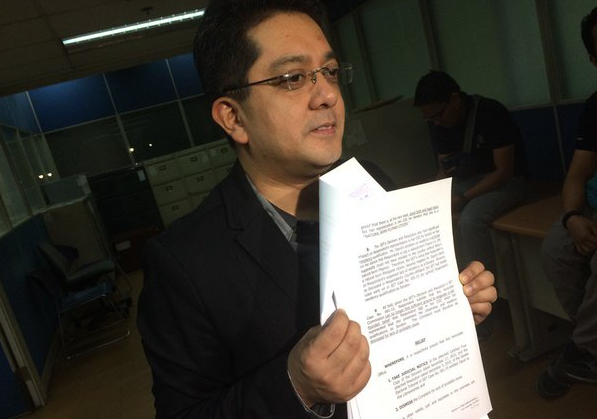 Atty. George Erwin Garcia, secretary-general of the Grace Poe Legal Team, leads protest versus Comelec resolution that he sees will open gate to cheating due to human intervention.