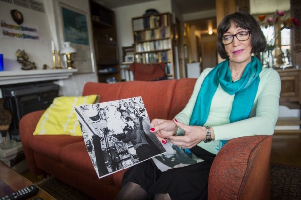 John Jeanette Solstad Remo shows a picture of herself as she worked as a submarine captain at her home in Oslo, on April 20, 2016.  She has always felt like a woman, although she was assigned male sex at birth. She now fights for a law that will allow transgender people to get legal recognition of their gender by making a simple declaration.  / AFP PHOTO / Fredrik Varfjell / TO GO WITH AFP STORY