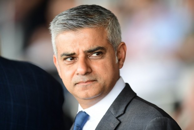 Britain's new London Mayor Sadiq Khan attends the Yom HaShoah Commemoration, the UK Jewish community's Holocaust remembrance ceremony, in Barnet, north London, on May 8, 2016. London's new Muslim mayor Sadiq Khan accused Prime Minister David Cameron on Sunday of using "Donald Trump playbook" tactics to try to divide communities in a bid to prevent his election. Khan won 57 percent of the vote in the May 5 mayoral election, securing 1.3 million votes to see off multimillionaire Tory Zac Goldsmith and making history as the first Muslim mayor of a major Western capital. / AFP PHOTO / LEON NEAL