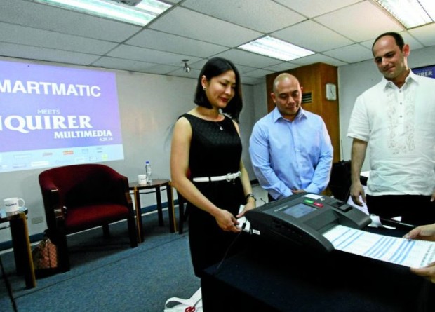  (from left) Smartmatic’s head for voter education Karen Jimeno, general manager Elie Moreno and sales technical coordinator Miguel Avila. RICHARD A. REYES