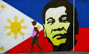A large tarpaulin bearing the face of Presumptive president Rodrigo Duterte has been set up as Duterte starts to accomodate guests and well wishers at the Matina Enclave in Davao City.INQUIRER PHOTO / MARIANNE BERMUDEZ 