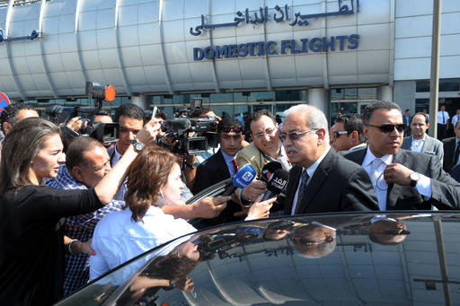 Egyptian Prime Minister Sherif Ismail talks to reporters at Cairo International Airport, Thursday, May 19, 2016. He said it was too early to say whether a technical problem or a terror attack caused the plane to crash. "We cannot rule anything out," he said. An EgyptAir flight from Paris to Cairo with 66 passengers and crew on board crashed in the Mediterranean Sea early Thursday morning, Egyptian aviation officials said. (AP Photo/Selman Elotefy)