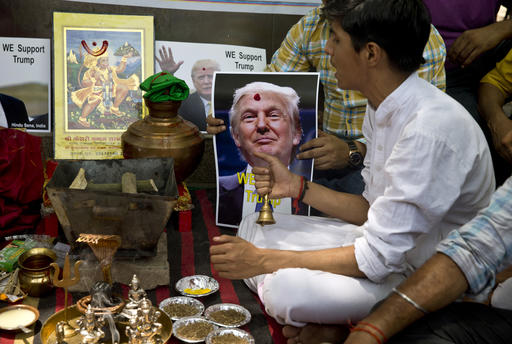 Activists of right-wing Hindu Sena or Hindu Army conduct Hindu rituals to ensure a win for U.S. presidential candidate Donald Trump in New Delhi, India, Wednesday, May 11, 2016. While Trump has dominated the Republican primary race to decide the party's candidate for the November election, his calls for temporarily banning Muslims from America and cracking down on terrorist groups abroad have earned him some fans in faraway India. (AP Photo/Saurabh Das)