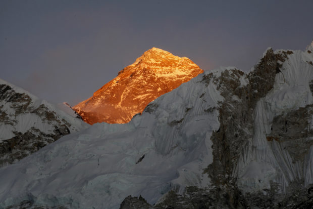 FILE - In this Nov. 12, 2015, file photo, Mt. Everest is seen from the way to Kalapatthar in Nepal. A 35-year-old Dutch man suffering from high-altitude sickness died on his way back from Mount Everest’s summit in the first death reported this year on the world’s highest mountain, an expedition organizer said Saturday, May 21, 2016. (AP Photo/Tashi Sherpa, File)