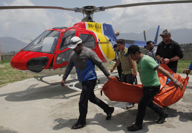 The body of Dutch climber Eric Arnold, who died last week near South Col during a Mount Everest expedition, is carried to Teaching hospital in Kathmandu, Nepal, Thursday, May 26, 2016. This year's busy climbing season follows two years of disasters that virtually emptied the mountain. (AP Photo/Niranjan Shrestha)