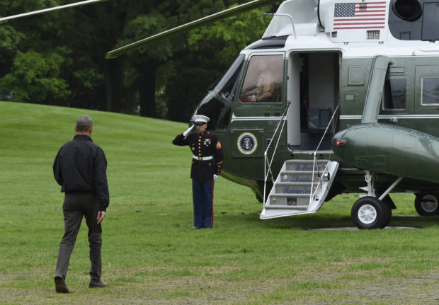 President Barack Obama heads to Marine One on the South Lawn of the White House in Washington, Saturday, May 21, 2016. Obama is leaving on a weeklong, 16,000-mile trip to Asia as part of his effort to pay more attention to the region and boost economic and security cooperation. (AP Photo/Susan Walsh)