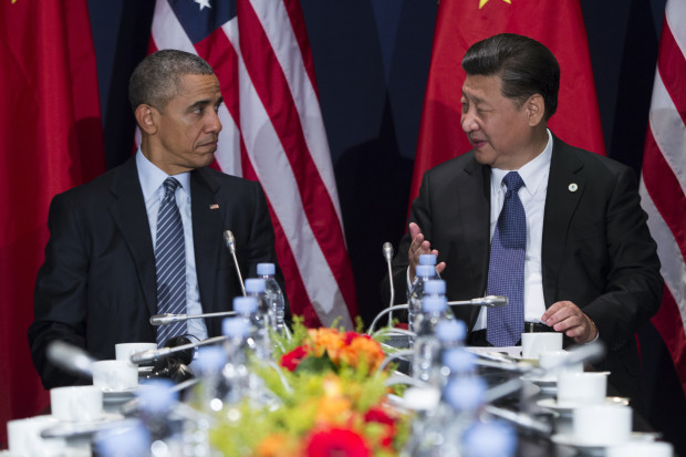 FILE - In this Nov. 30, 2015, file photo, U.S. President Barack Obama, left, meets with Chinese President Xi Jinping on the sidelines of the COP21 United Nations Climate Change Conference in Le Bourget, outside Paris, Monday, Nov. 30, 2015. By visiting Hiroshima, Barack Obama parachutes himself into a seemingly endless dispute among key U.S. allies and trading partners over World War II. In Tokyos decades-long tug-of-war over history with its neighbors China and South Korea, its the American president who could end up losing. (AP Photo/Evan Vucci, File)