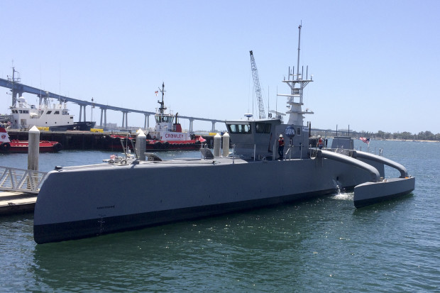 A self-driving, 132-foot military ship sits at a maritime terminal Monday, May 2, 2016, in San Diego. The Pentagon's research arm is launching tests on the world's largest unmanned surface vessel designed to travel thousands of miles out at sea without a single crew member on board. (AP Photo/Julie Watson)