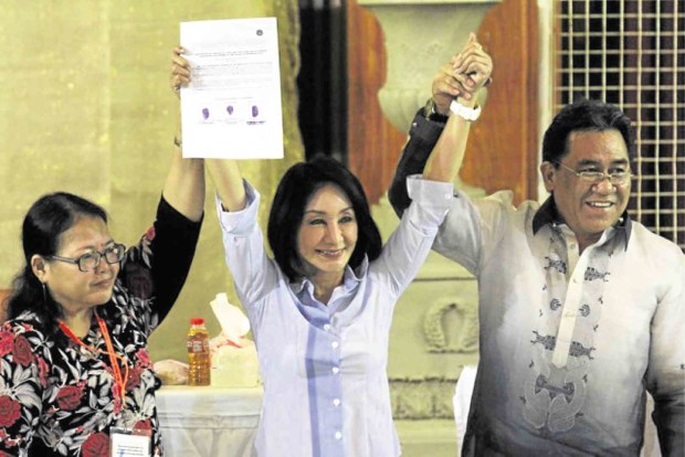 ANOTHER member of a political dynasty, Gwen Garcia, is proclaimed winner in the race for a House seat for the third district of Cebu province.       JUNJIE MENDOZA/CEBU DAILY NEWS