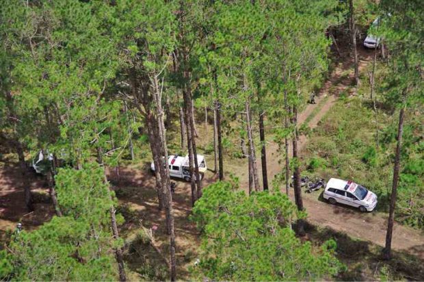 POLICE enter the site of illegal logging in a forest in Bauko, Mountain Province and secure the area.    RICHARD BALONGLONG  / INQUIRER NORTHERN LUZON 