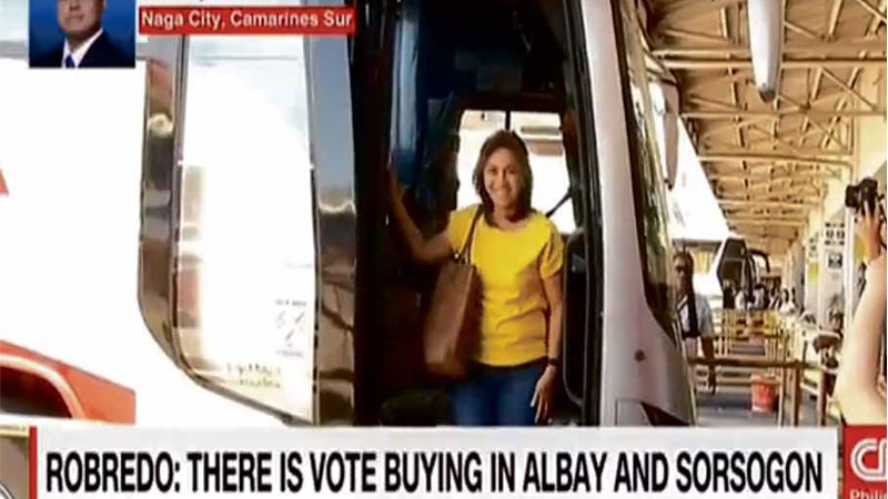 ROBREDO alights from the bus that took her back home toNaga, in this photograb from the Facebook page of CNN Philippines.