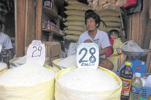 SHOPKEEPERS in the public market of Bongao, capital of the island province of Tawi-Tawi, sell goods, including rice, mostly imported from Sabah in Malaysia. KARLOS MANLUPIG/INQUIRER MINDANAO