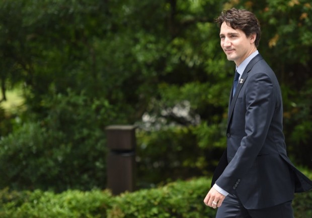 Canadian Prime Minister Justin Trudeau arrives at Ise-Jingu Shrine in the city of Ise in Mie prefecture, on May 26, 2016, on the first day of the G7 leaders summit. World leaders kicked off two days of G7 talks in Japan on May 26 with the creaky global economy, terrorism, refugees, China's controversial maritime claims, and a possible Brexit headlining their packed agenda.  AFP PHOTO