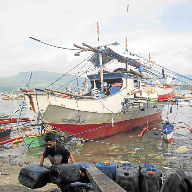 FISHING boats are docked along the coastline of Barangay Calapandayan in Subic, Zambales. Local fishermen, who have been frequenting the Scarborough Shoal on these boats, are anxiously awaiting the UN tribunal decision on the case filed by the Philippine government against China for intrusion into areas considered as Philippine territory. ALLAN MACATUNO/INQUIRER CENTRAL LUZON