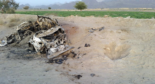 This photo taken by a freelance photographer Abdul Salam Khan using his smart phone on Sunday, May 22, 2016, purports to show the destroyed vehicle in which  Mullah Mohammad Akhtar Mansour was traveling in the Ahmad Wal area in Baluchistan province of Pakistan, near Afghanistan's border. A senior commander of the Afghan Taliban confirmed on Sunday that the extremist group's leader,  Mullah Mohammad Akhtar Mansour, has been killed in a U.S. drone strike. (AP Photo/Abdul Salam Khan)