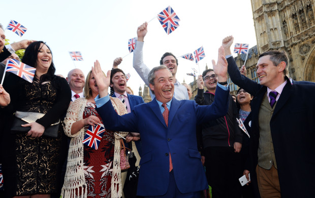 Nigel Farage, the leader of the UK Independence Party celebrates with his supporters in London, Friday, June 24, 2016. Britain voted to leave the European Union after a bitterly divisive referendum campaign, according to tallies of official results Friday. (Anthony Devlin/PA via AP) UNITED KINGDOM OUT, NO SALES, NO ARCHIVE