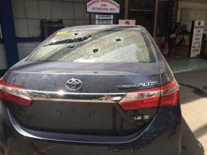 The car of drug suspects Asnawe Ala and Khalid Amintao is seen riddled with bullets, after the two were killed by members of the Criminal Investigation and Detective Group of the Philippine National Police in the National Capital Region.  Police said the two shot it out with cops after realizing they were dealing with undercover police during a drug buy-bust on June 21, 2016 along NIA Road, Quezon City. (Photo by Jodee Agoncillo, INQUIRER)