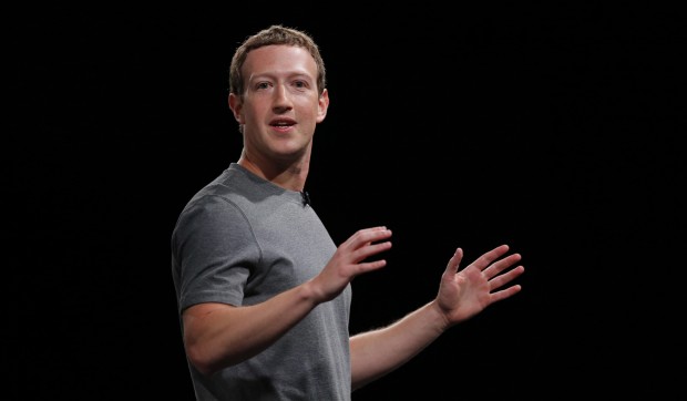 File-This Feb. 21, 2016, file photo sshows Facebook CEO Mark Zuckerberg speaking during the Samsung Galaxy Unpacked 2016 event in Barcelona, Spain. Some of Zuckerberg's neighbors are grumbling about a rock wall he's having built on his property on Kauai's north shore. Retiree Moku Crain said Tuesday, June 28, 2016, the wall looks daunting and forbidding. Crain hopes and expects Zuckerberg will soften the wall's look by planting foliage around it. The wall began going up about four to six weeks ago. It runs along the property next to a road in the semi-rural community of Kilauea. (AP Photo/Manu Fernadez, File)