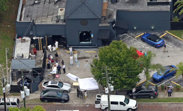 Aerial view  Sunday, June 12, 2016 of the mass shooting scene at  the Pulse nightclub in Orlando, Fla. A gunman opened fire inside a crowded gay nightclub early Sunday, before dying in a gunfight with SWAT officers, police said.  (Red Huber/Orlando Sentinel via AP)