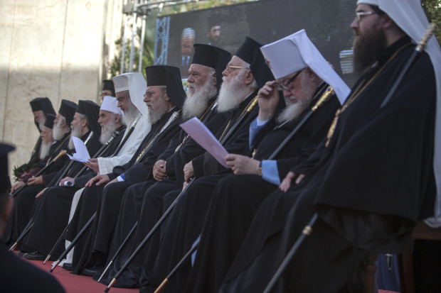In this Saturday, June 18, 2016 photo released by Holy and Great Council, Orthodox Patriarchs taking part in the historic Holy and Great Council sit outside the church of St. Titus before celebrating Vespers of Pentecost in Heraklion, on the island of Crete. A historic attempt to bring together all leaders of the world's Orthodox churches for the first time in more than a millennium has stalled after the powerful Russian church and three others pulled out at the last minute over disputes ranging from the seating plan to efforts to reconcile with the Vatican. (Sean Hawkey/Holy and Great Council via AP)