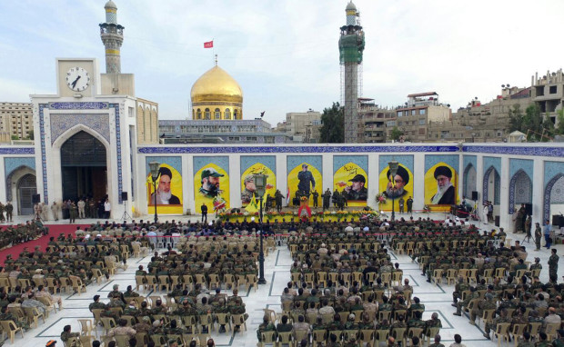 In this Tuesday, May 17, 2016 picture released by Hezbollah media department, shows Hezbollah supporters attending a ceremony to mark the death of slain top commander Mustafa Badreddine, who was killed in Syria last week, at the shrine of Sayyida Zeinab, in a suburb of Damascus, Syria . Badreddine died in an explosion in Damascus, a death that is a major blow to the Shiite group, which has played a significant role in the conflict next door. (AP Photo/Hezbollah Media Department)