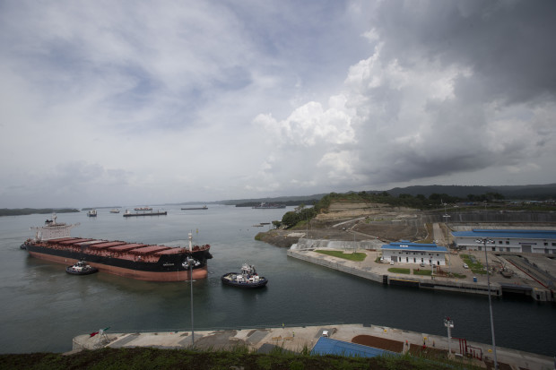 The Malta flagged cargo ship named Baroque, a post-Panamax vessel, arrives to the Agua Clara locks on a test of the newly expanded Panama Canal in Agua Clara, Panama, Friday, June 24, 2016. The canal's expansion project will be officially inaugurated on Sunday. (AP Photo/Moises Castillo)