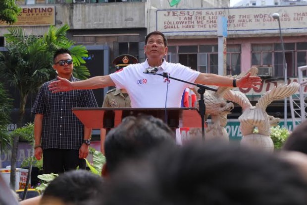 President-elect Rodrigo Duterte gestures to stress a point in his speech during the flag-raising ceremony at the Davao City Hall on Monday morning, June 27, 2016. (Photo by Ace Morandante, contributor)