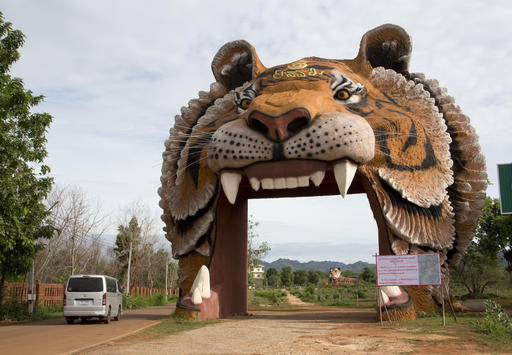 A vehicle enters the "Tiger Temple" in Saiyok district, Kanchanaburi province, west of Bangkok, Thailand, Thursday, June 9, 2016. Temple spokesman Siri Wangboongerd on Thursday said the abbot has no knowledge of any illegal activities that may have been committed in the temple. AP