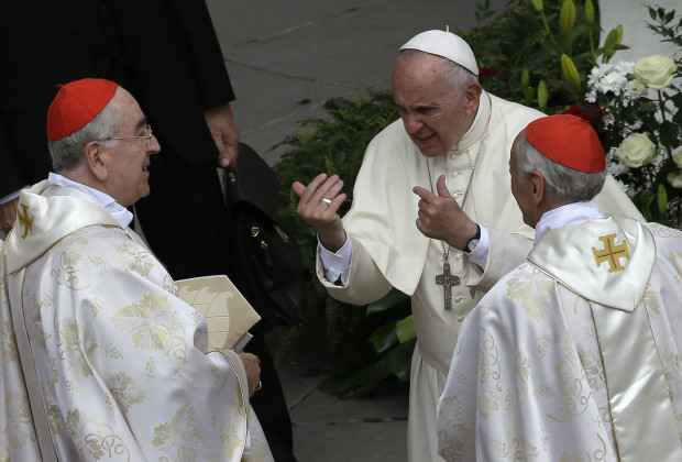 Pope Francis  meets with cardinals at the end of a Jubilee mass for priests in St. Peter's Square at the Vatican, Friday, June 3, 2016. (AP Photo/Alessandra Tarantino)