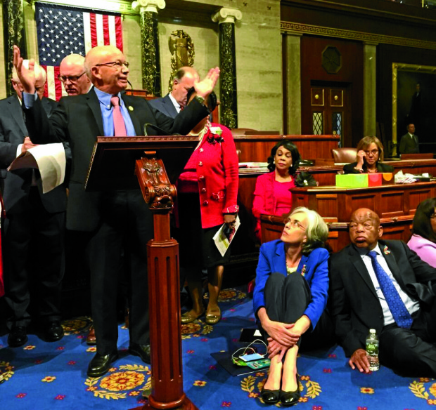 SIT-IN PROTEST Democratic Representatives Peter DeFazio of Oregon, Katherine Clark of Massachusetts and John Lewis of Georgia participate in a sit-in protest seeking a vote on gun-control measures in the US House of Representatives onWednesday. AP