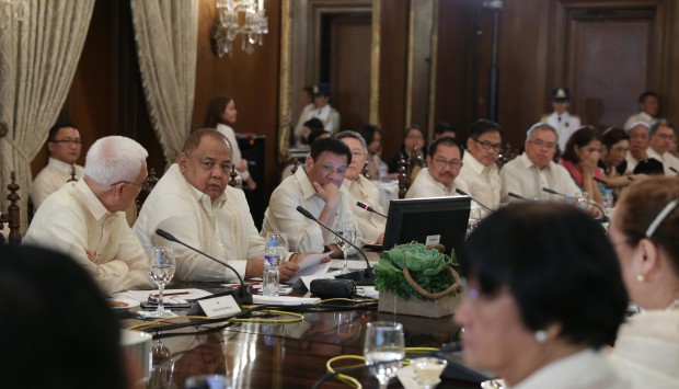 President Rodrigo Roa Duterte holds his first Cabinet meeting being held at the Aguinaldo State Dining Room of the Malacañan Palace. The agenda focuses on disaster risk reduction and management status of the country. MALACAÑANG POOL PHOTO