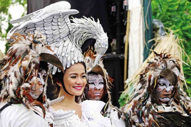 TAKING FLIGHT  Wearing eagle-inspired costumes, street dancers join the launch of the 18th Philippine Eagle Week to call attention to the plight of the endangered eagles in the wild. KIMBERLY DELA CRUZ