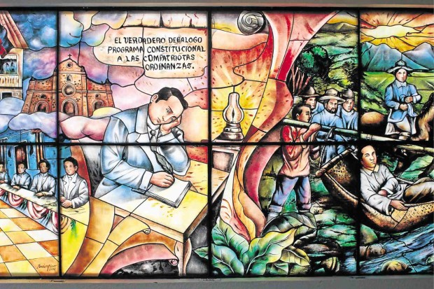 A STAINED glass display at the Mabini Shrine in Tanauan City shows Apolinario Mabini writing “El Verdadero Decalogo” (The True Decalogue), a set of rules to guide Filipinos on how to become better citizens, in May 1898. MARICAR CINCO /INQUIRER SOUTHERN LUZON