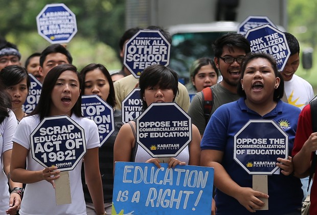 CHED RALLY/MAY 25,2016 Militant students rally outside the Commission on Higher Education in UP Diliman, Quezon City in protest against the increase of tuition and school fees for the coming school year. They are asking presumptive president elect Rodrigo Duterte to stand for free education. INQUIRER PHOTO/RAFFY LERMA