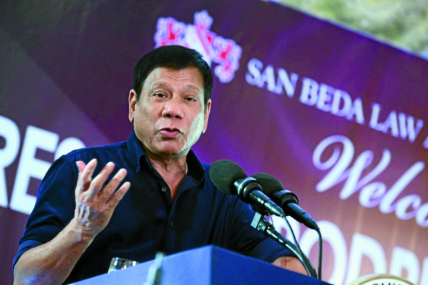MINDANAO WON'T BE LEFT OUT. President Rodrigo R. Duterte tells guests of the Testimonial Dinner Reception organized by the San Beda Law Alumni Association at the Kalayaan Hall of Club Filipino in San Juan City, Manila on Thursday, July 14, 2016 that one of the primary reasons that he ran for president is that no other candidate had a clear cut platform for Mindanao. KING RODRIGUEZ/PPD