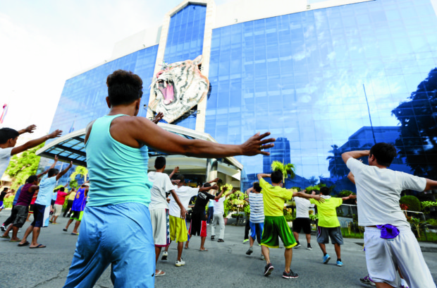 ZUMBA FOR DRUG PERSONALITIES / JULY 24, 2016 Drug personalities who voluntarily surrender in the Eastern Part of Metro Manila conduct simultaneously do Zumba, dubbed as "Lulong sa Droga noon, Lulong sa Zumba Ngayon" held at at Maysilo Circle, Mandaluyong City, July 24, 2016. The simultaneous zumba will be done in the cities of Mandaluyong, Marikina, San Juan and Pasig. Eastern Police District under the leadership of PSSupt. Romulo Sapitula spearhead the said activity.  INQUIRER PHOTO / NINO JESUS ORBETA