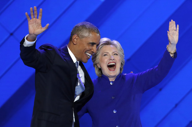 President Barack Obama and Democratic Presidential nominee Hillary Clinton wave to delegates after President Obama's speech during the third day of the Democratic National Convention in Philadelphia , Wednesday, July 27, 2016. AP 