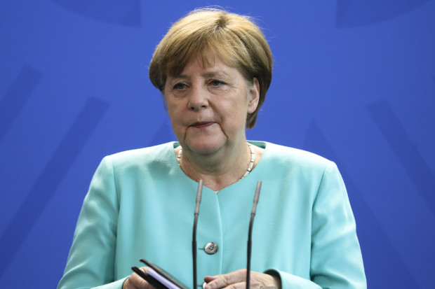 German Chancellor Angela Merkel speaks during a statement about the referendum in Britain at the chancellery in Berlin, Friday, June 24, 2016. Britain voted to leave the European Union after a bitterly divisive referendum campaign, according to tallies of official results Friday. (AP Photo/Markus Schreiber7