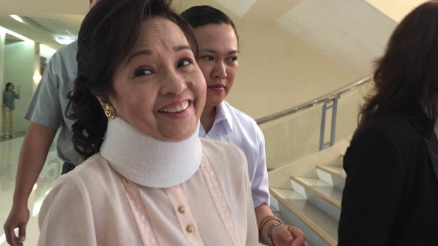Former president now Pampanga representative Gloria Arroyo laughs as reporters asked how she feels going back at the House of Representatives after being in hospital detention for four years. Photo by Marc Jayson Cayabyab, Inquirer.net 