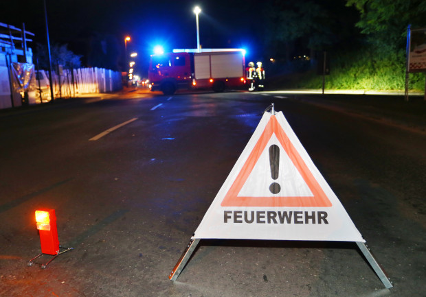 A firetruck blocks a road in Wuerzburg, southern Germany, Monday evening, July 18, 2016. A man attacked people in a train and injured more than a dozen. (Karl-Josef Hildenbrand/dpa via AP)