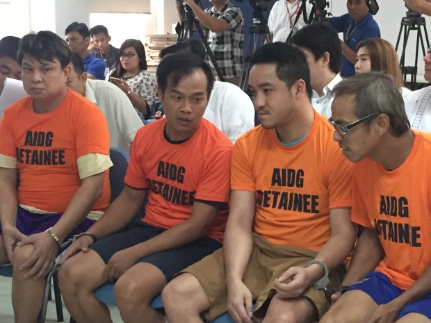     Four Hong Kong nationals arrested inside a "floating shabu laboratory" off Subic undergo inquest proceedings at the Department of Justice on July 13. TETCH TORRES-TUPAS