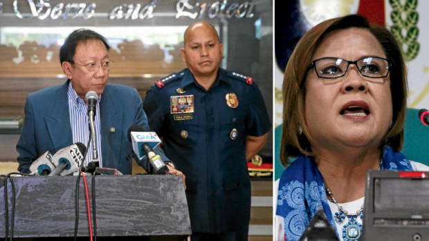 NOFEAR Solicitor General Jose Calida calls on police personnel not to be afraid of inquiries that will be conducted by Congress, including a proposal by Sen. Leila de Lima (right), into the killing of drug suspects during a press conference at the Philippine National Police headquarters in Camp Crame. With him is PNP Director General Ronald de la Rosa. PNP PHOTO/INQUIRER FILE PHOTO