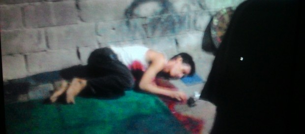 In this screen grab from the Eastern Police District-Criminal Investigation and Detection Group, alleged drug trafficking group leader Randay “Kamote” Santos lies in a pool of blood after an encounter with the police during a buy-bust operation in Cainta, Rizal, on July 30.