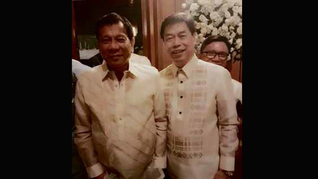 ‘KUMPARE’ President Duterte and Cebuano businessman Peter Lim, suspected to be a drug lord, are shown in this photo taken from the Facebook account of Facts Against Ignorance during the wedding of Israeli expatriate Yuri Ofek and Beatrice Borja in Lapu-Lapu City, Cebu province, on June 25.FACTS AGAINST IGNORANCE FACEBOOK ACCOUNT