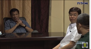President Rodrigo Duterte grants suspected drug lord Peter Lim an audience on July 15, 2016.  Lim, a long-time businessman in Cebu, wanted to clear his name after Duterte himself named him as one of the three biggest drug traffickers in the country.  Duterte told Lim to subject himself to an investigation. (SCREENSHOT OF RTVM VIDEO)