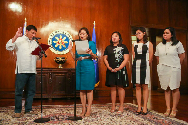 VICE President Leni Robredo is sworn in by President Duterte as the chairperson of Housing and Urban Development Coordinating Council. Her oath taking is witnessed by her three daughters, Aika, Tricia and Jillian Robredo.  VICE President Leni Robredo is sworn in by President Duterte as the chairperson of Housing and Urban Development Coordinating Council. Her oath taking is witnessed by her three daughters, Aika, Tricia and Jillian Robredo.  VICE President Leni Robredo is sworn in by President Duterte as the chairperson of Housing and Urban Development Coordinating Council. Her oath taking is witnessed by her three daughters, Aika, Tricia and Jillian Robredo.  PHOTO FROM VP LENI ROBREDO'S OFFICE